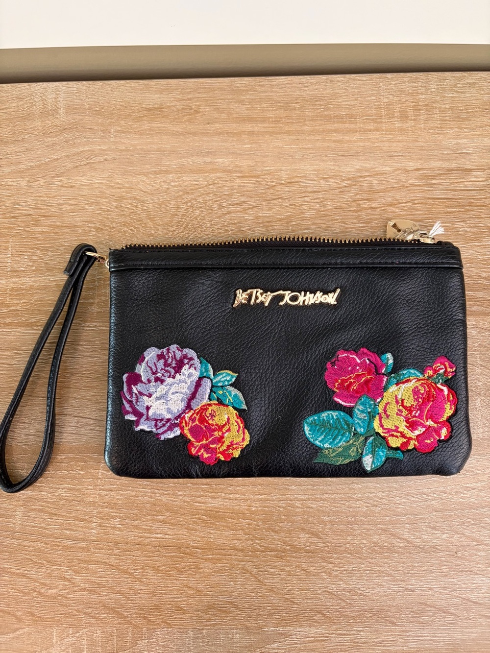 Betsey Johnson Black Wristlet with Colorful Floral Appliqué